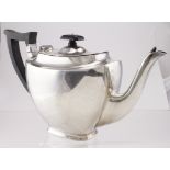 Silver teapot, hallmarked 'WH&SsLtd, Sheffield 1931 (William Hutton & Sons Ltd)', height 15.5cm,