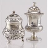 Two silver pepper pots, Hallmarked London 1825 by James Arthur & 1795? By BC&N. total weight 128g