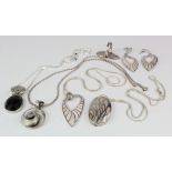 Mixed lot of silver jewellery to include a ring and pendant set, a pendant and earring set and two