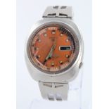 Gents Seiko 5 Sports "Water 70 Proof" wristwatch. The orange dial with day/date aperture at 3 o'