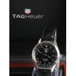 Gents Tag Heuer Carrera Twin-Time automatic stainless steel cased wristwatch. The circular black