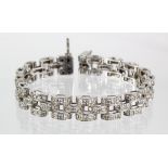 18ct white gold three row panther link bracelet with diamond set links, total diamond weight approx.