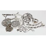 Three silver pendants, two pairs of silver earrings, one silver ring and two silver bracelets,