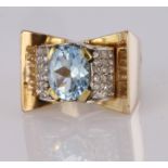 18ct rose gold and platinum French 1940's cocktail ring set with blue topaz and diamonds, finger