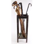 Walking sticks. A collection of ten various walking sticks, a couple with silver mounts (sold as