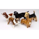 Beswick. A collection of five beswick dogs, including Labrador, Bulldog, Corgi, etc., tallest 80mm
