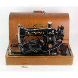 Singer Electric Sewing Machine, with pedal, contained in original case, (untested, sold as seen,