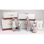 Nao. A collection of nine Nao porcelain figures, including five contained in original boxes,
