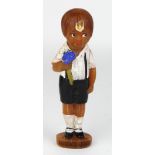 Unusual 1930's/40's figural soap bar of small school boy holding a bunch of blue flowers. Front of