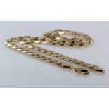 Yellow metal (stamped 375) flat curb necklace. Approx length 21", weight 61.4g