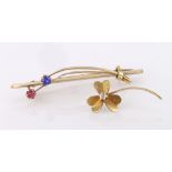 15ct yellow gold floral brooch (broken) set with a single diamond ruby and sapphire. Weight 3.6g