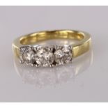 Yellow metal stamped 750 three stone Diamond set Ring approx 0.75ct weight size J weight 4.8g
