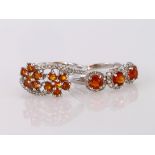 Two 9ct white gold rings to include a fire opal and diamond triple cluster ring, finger size M,