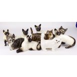 Cat interest. A collection of nine porcelain figures, depicting cats, including Beswick, etc.