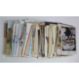 Military selection of various old and modern postcards + a couple of stamps. (Qty)