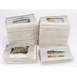 Camera colour postcard packets, 8 cards per pack, assorted resorts, 100 packets housed in 2 boxes (