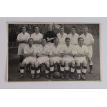 Football - Swansea Town postcard sized press photo with team line up taken before match at