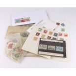 China, selection of stamps on leaves, in packets, loose, etc. Includes some large mint multiples.