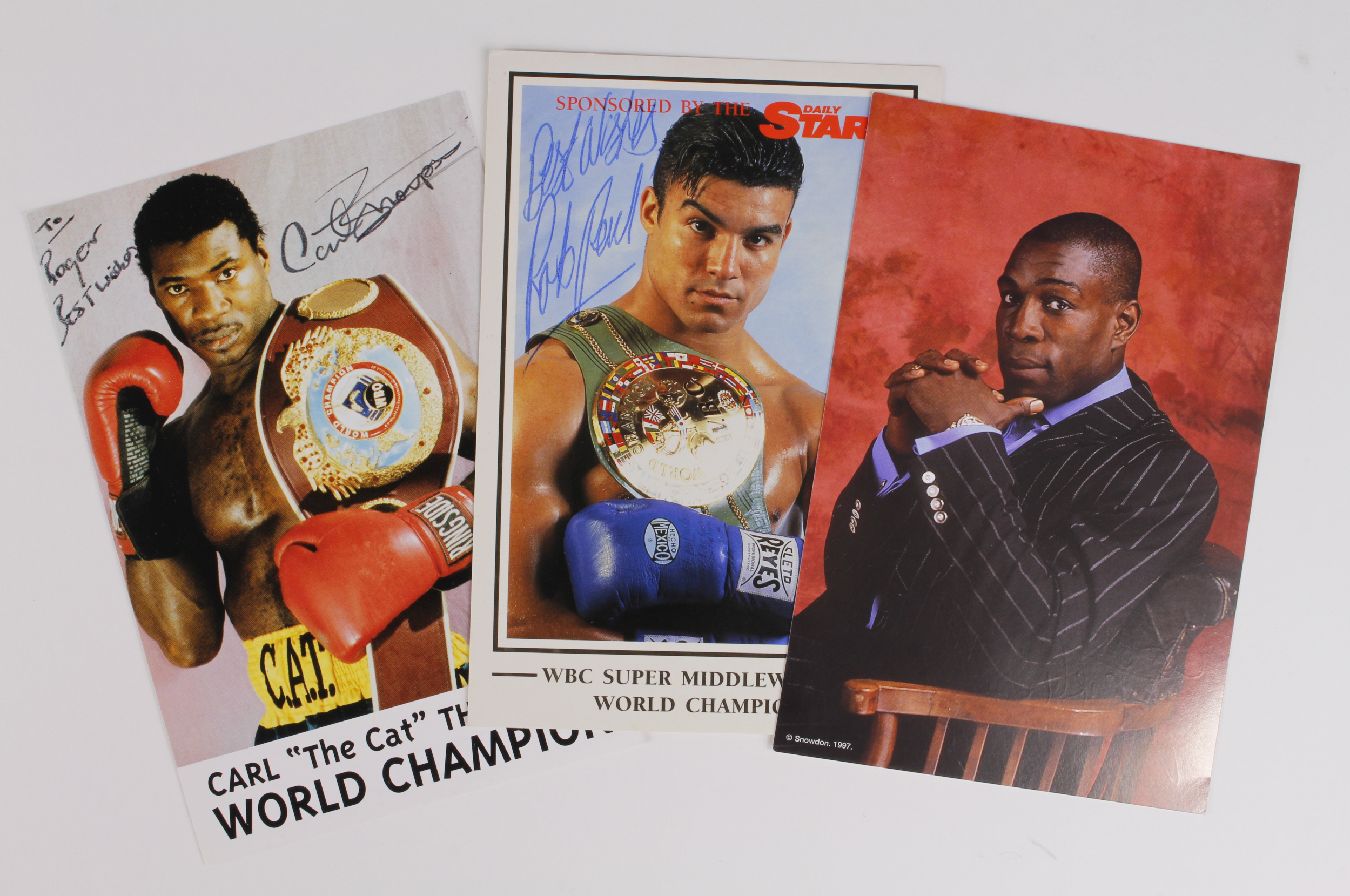 Boxing - coloured promo postcards of World Champion Boxers, hand signed by Frank Bruno, Carl
