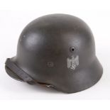 German steel Helmet a Whermacht M35 double decal, small size,with liner & chinstrap, maker stamped.