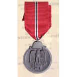 German Russian front medal with award document to Ogefr. August Lindfeldt dated 17 -6-1942.
