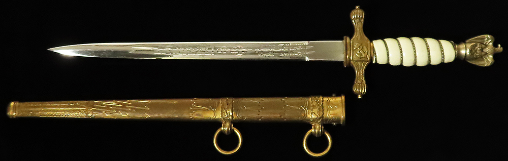 German Nazi Naval Dagger with scabbard. Blade maker marled 'Original Eickhorn Solingen'.