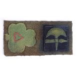 Badges a WW2 Divisional arm badge set, unknown Irish unit, faded still on battledress backing.