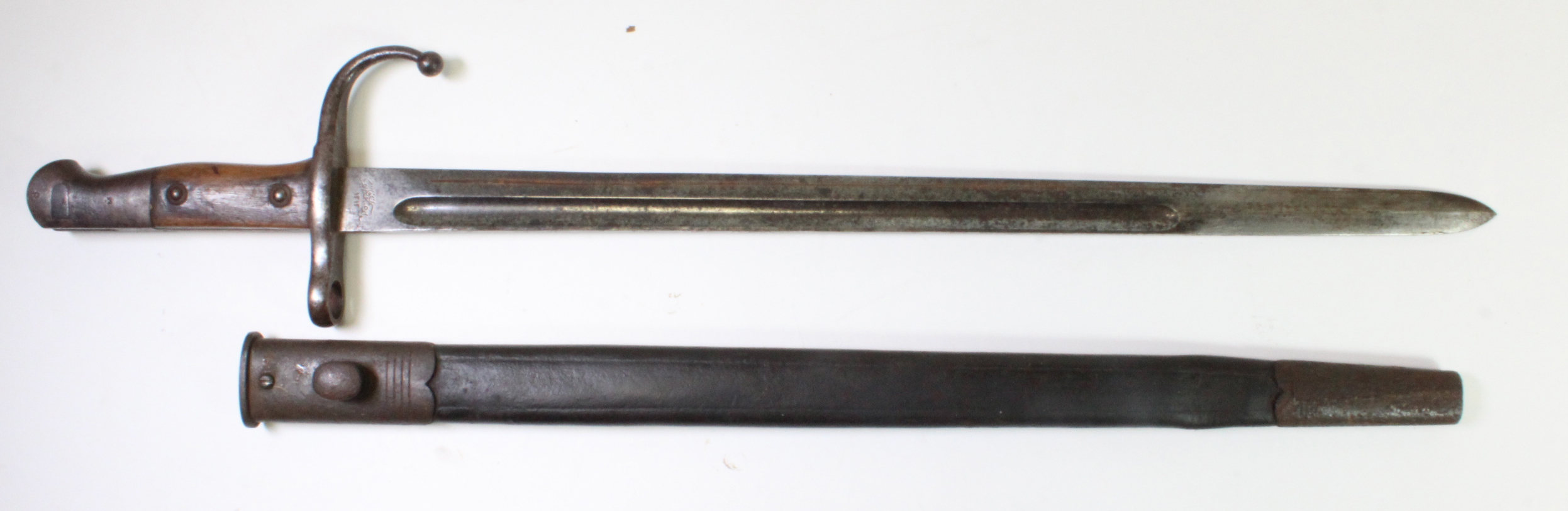 Bayonet scarce Turkish model 1896 sword bayonet in its leather scabbard.