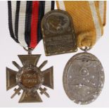 German medals - WW1 Honour Cross with Swords, Nazi West Walls Medal, and a 1918 '11.Armee' pin