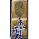 German Mothers Cross in silver in fitted case with a mothering day badge