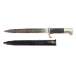 German M1938 long dress bayonet, polished 10" blade with "WKC" & helmet logo to ricasso. In its