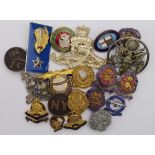 Military related badges (20) including 10 relating to the Royal Artillery