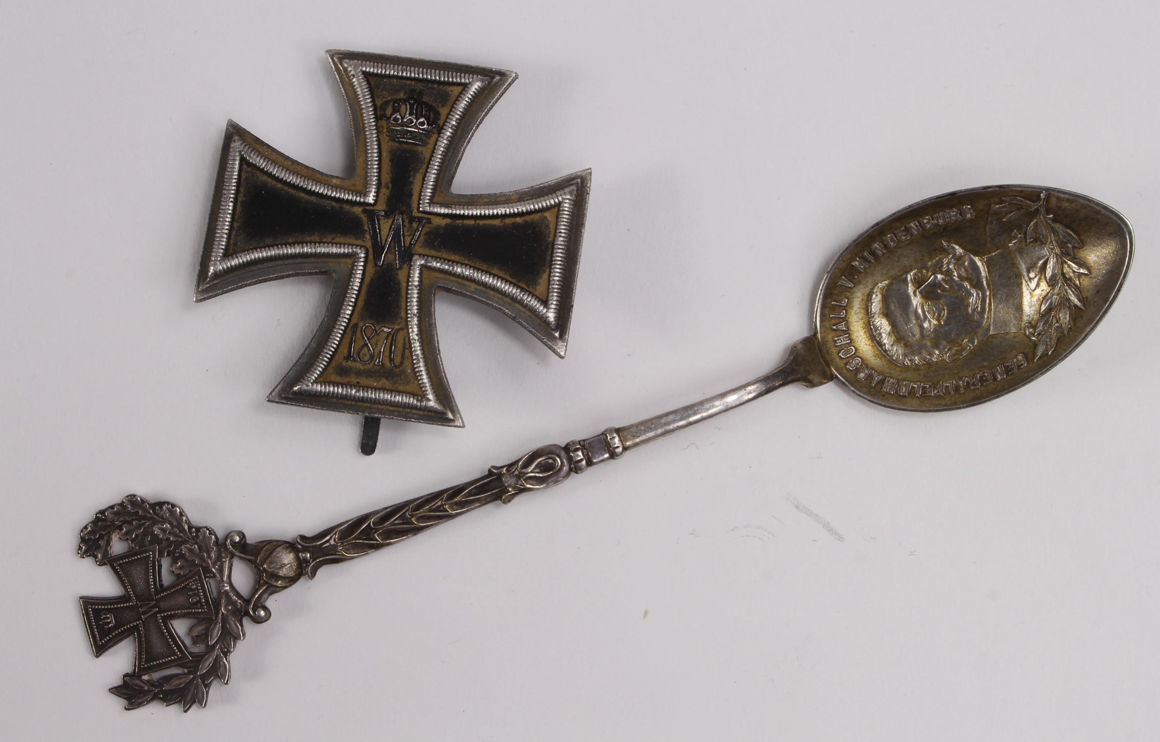 German WW1 Iron Cross 1st Class, with a Hindenburg commemorative spoon. (2)