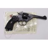 Revolver, a .38 Cal Webley MkIV. Much original finish. Barrel 5". A good example of this WW2 and