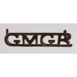 Badge: GMGR - Guards Machine Gun Regiment rare WW1 shoulder title badge. In use from February 1918