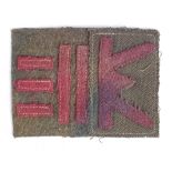 Badges a Welsh Division WW2 set sewn on battledress cloth, service worn.