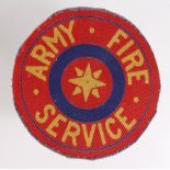 Badge a scarce Army Fire Service printed cloth sleeve badge, glue to reverse.