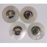 Military related mother of pearl counters. (4)