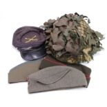 British steel helmet MkIV, with camouflage, plus 4x various soft hats. (5)