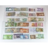 World (430+), mixed world banknotes in album sleeves including Germany, UAE, Maldives, Ghana,