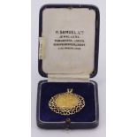 1915 George V Gold Half sovereign in an ornate 9ct Mount weight 7.0g