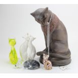 Cat interest. A collection of six cat figures, makers include, an Egyptian Cat by Austin