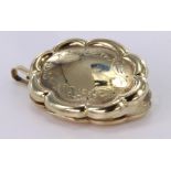 9ct Gold hinged Locket weight 6.8g