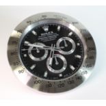 Advertising Wall Clock. Chrome 'Rolex' advertising wall clock, black dial reads 'Rolex Oyster