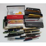 Pens & Pencils. A collection of over thirty fountain pens, ballpoint pens, pencils etc., makers
