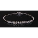 White Gold stamped 750 Baguette and Round Diamond Tennis Bracelet approx 2.0 ct. Diamond weight,