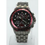 Gents Citizen Eco Drive Red Arrows stainless steel cased wristwatch with red/black bezel. Approx