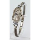 Ladies 18ct white gold cased cocktail watch with diamond bezel. Watch not working