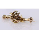 Bar Brooch marked 15ct set with Seed Pearls, Star and Crescent Moon type weight 4.2g