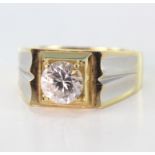 Yellow metal stamped 750 CZ set Ring size S weight 8.6g